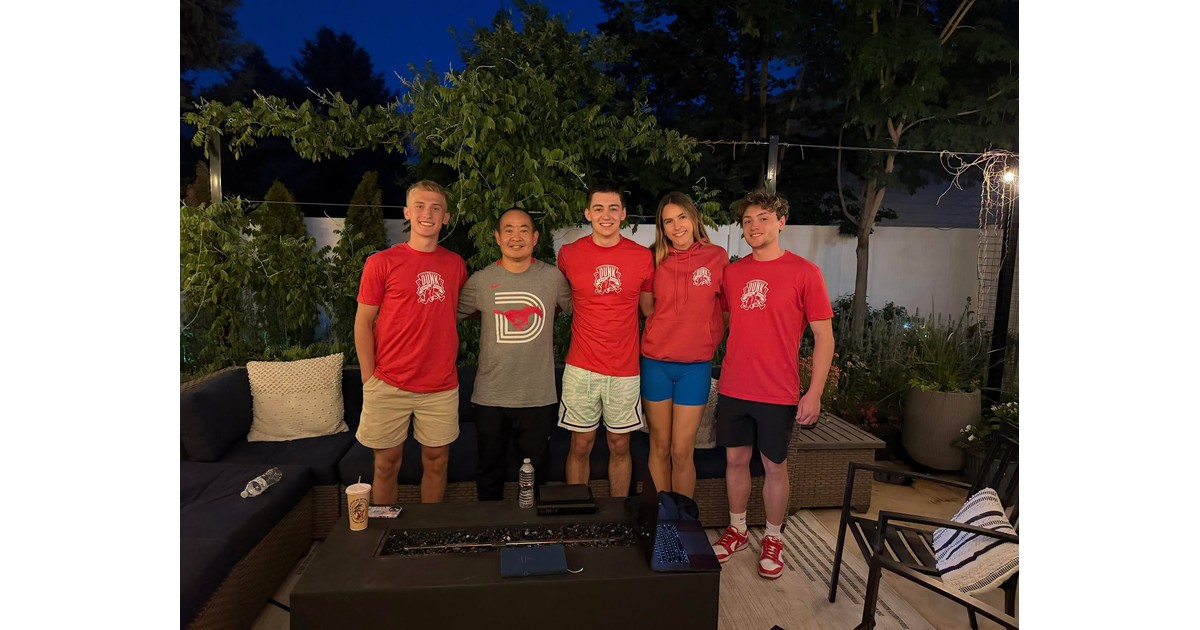 Dennis Yu with young AI builders from Dunk Camp