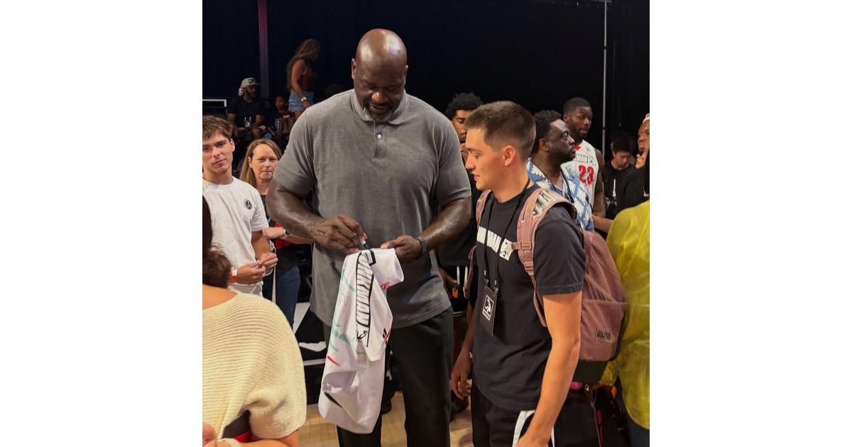Dylan Haugen with Shaquille O'Neal at a DunkMan event